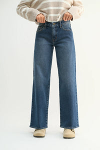 Wide-leg blue denim mid rise jeans with light stretch in a straight cut silhouette