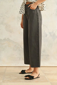 High waisted baggy wide leg pants with button-front closure for a relaxed fit