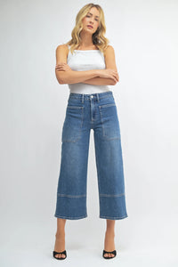 High rise cropped wide leg denim jeans in light blue with distressed details