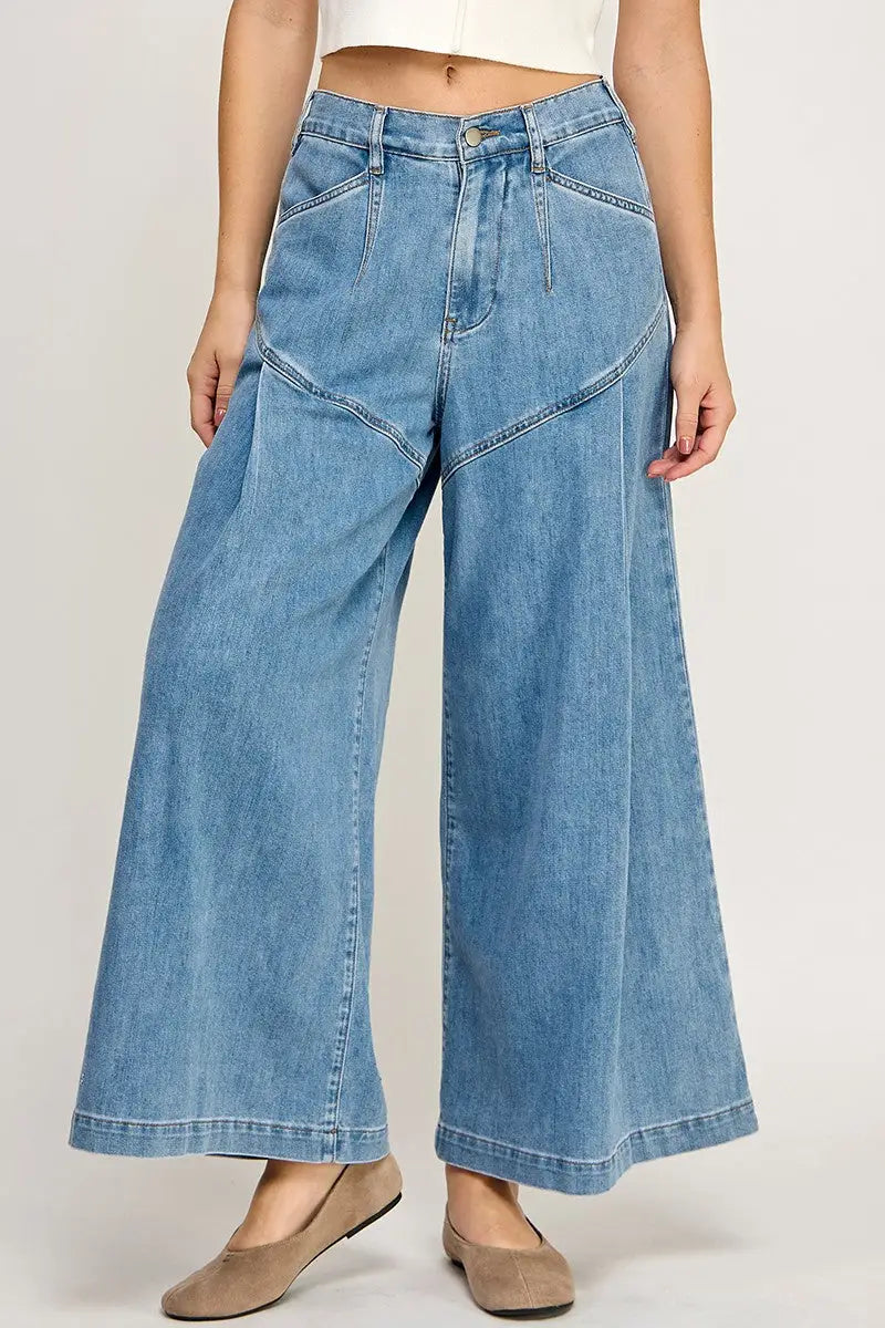 Wide-leg flare jeans from Shop Daisy, ideal for women’s boho chic clothing styles