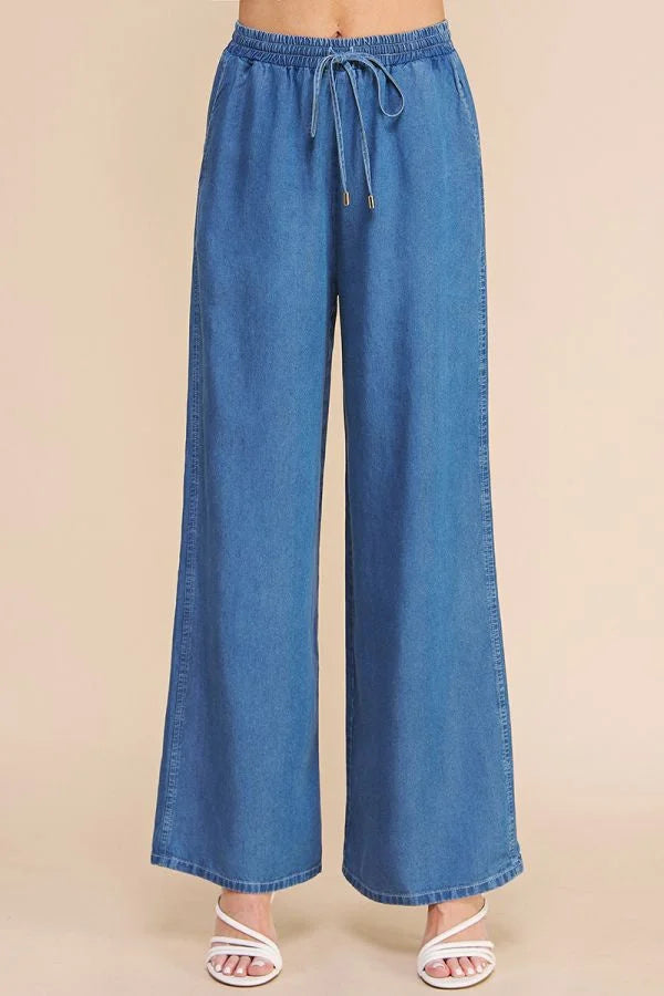 Wide-leg Wash Chambray Denim Tie-Waist Pants with Pockets and White Sandals