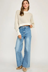 Ribbed knit balloon sleeve sweater with light wash high-waist wide-leg jeans