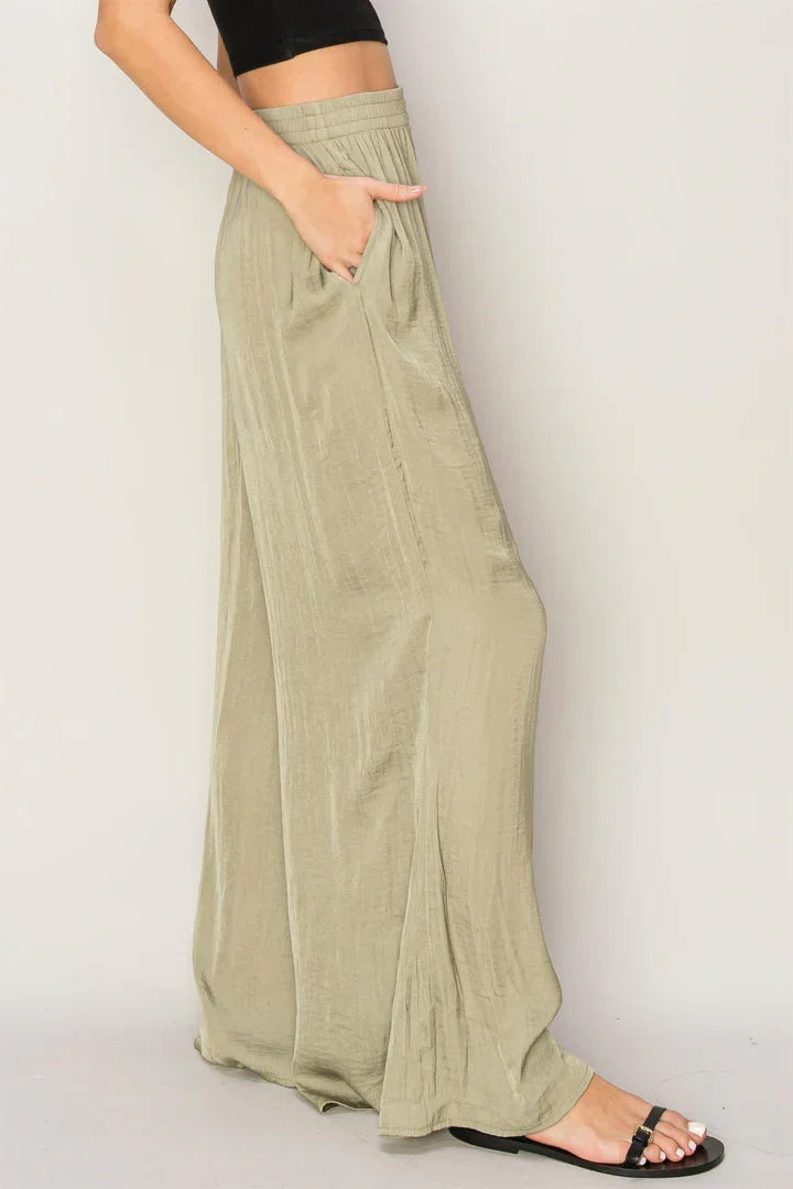 Wide-leg khaki pants in washed satin with drawstring waist and side pockets, boho style