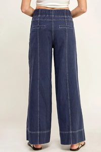 Wide leg pants in navy blue cotton twill featuring relaxed fit and visible stitching