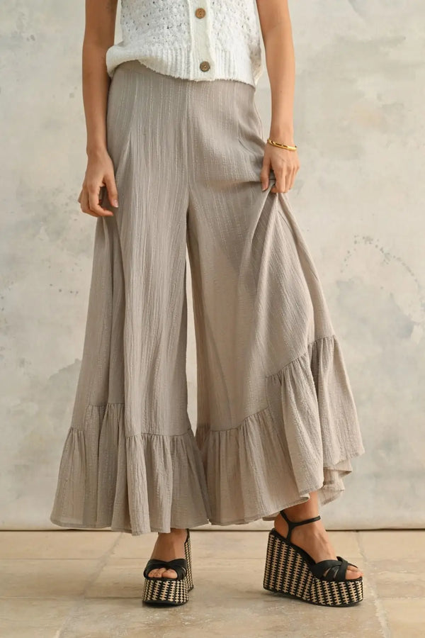 Wide-leg ruffled bottom detail pants from Daisy Lane with a unique fashionable silhouette