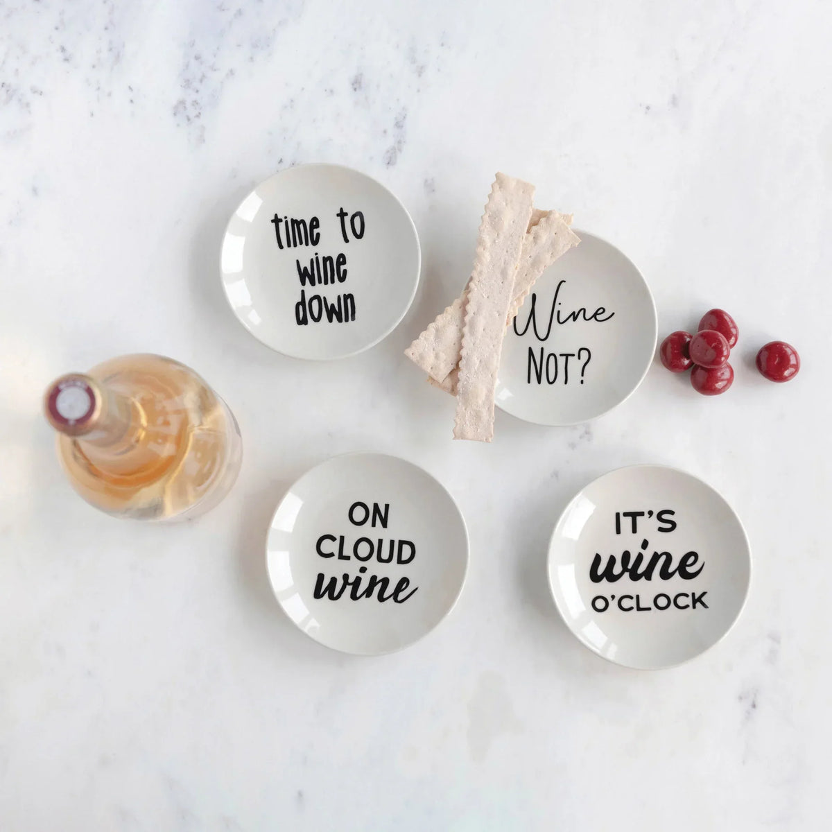 Decorative stoneware dish with wine sayings, perfect for women’s boho chic clothing shopping at Shop Daisy