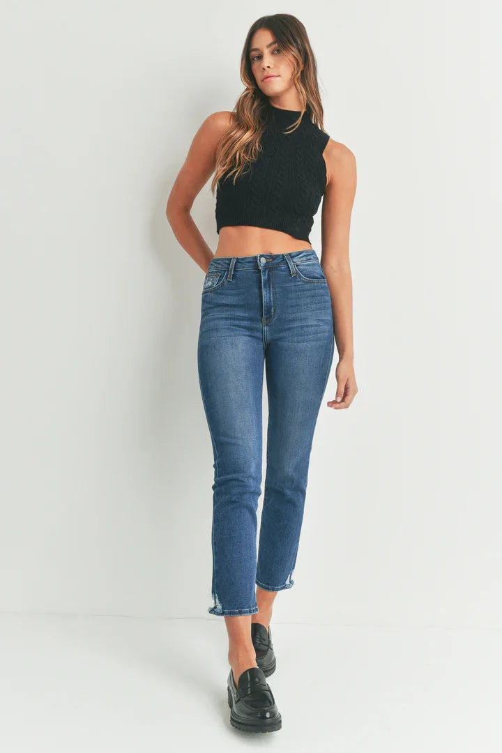 Woman in a black crop top and blue jeans showcasing SLIM STRAIGHT W/ DISTRESS DENIM