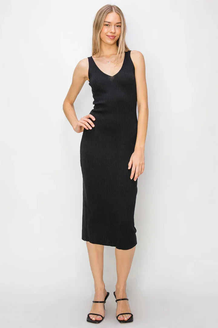 Woman in a black V Neck Ribbed Knit Bodycon Midi Dress showcasing shoulder straps style