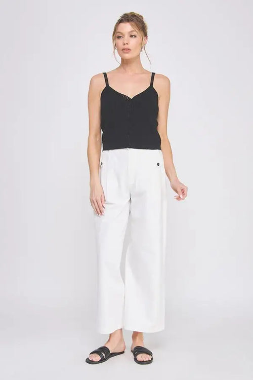 Woman wearing COTTON ELASTIC BACK WAIST PANTS with stretchy waistband and accent buttons