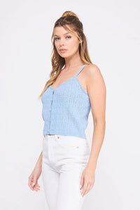 Woman wearing PIONTELLE knit V neck tank top in blue, perfect for women’s boho chic clothing at Shop Daisy