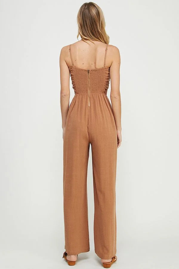 Woman in a brown jumpsuit, showcasing the elegance of Soft Linen Jumpsuit for women