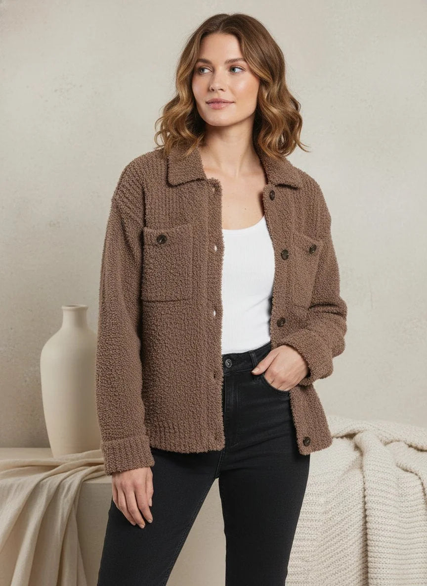 Woman wearing THREAD AND SUPPLY Lois Sweater Jacket in brown teddy-knit over white top
