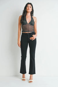 Woman modeling dark crop top and flared black pants with PETITE BOOTCUTDENIM JEANS