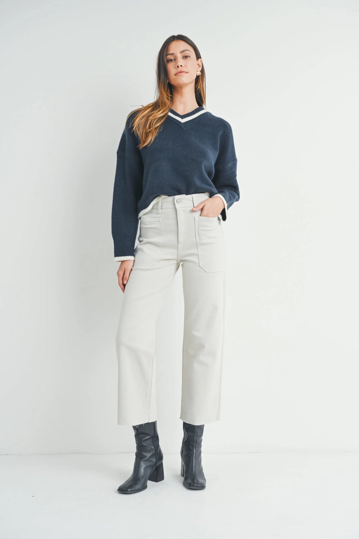 Woman in washed black sweater and white cropped pants styled with Nautical Wide Leg Denim