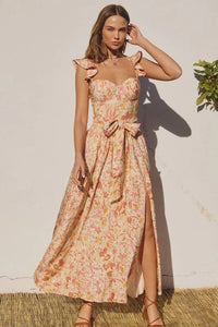 Woman in floral print SUNNY DAYS Corset Top Maxi Dress, perfect summer dress