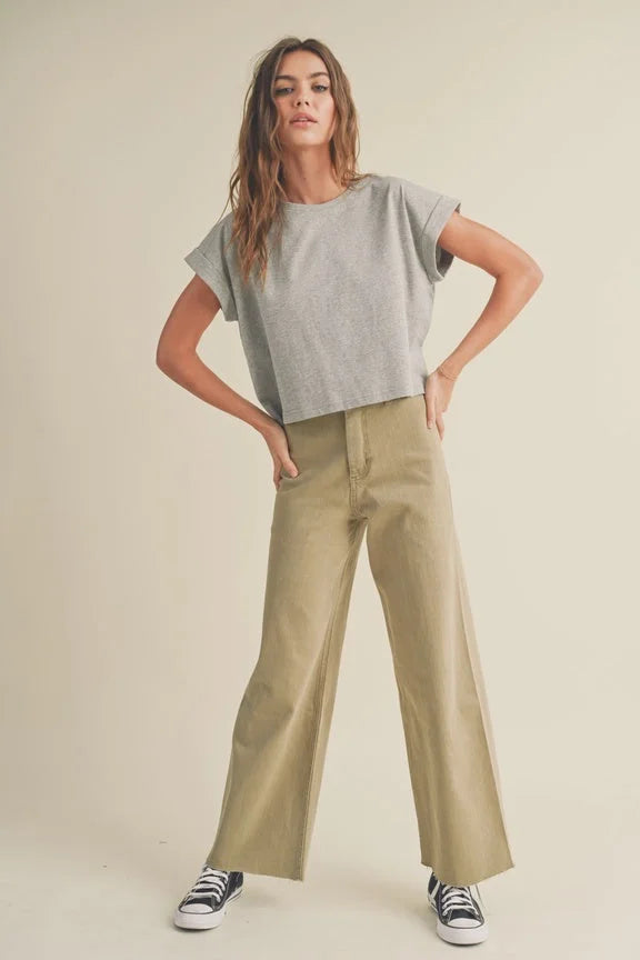 Woman in gray crop top and sneakers showcasing Straight Wide Leg Denim Pants