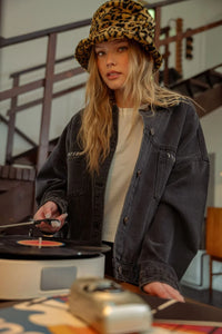 Woman wearing leopard collar black bucket hat and black denim jacket for LEOPARD COLLAR BLACK DENIM