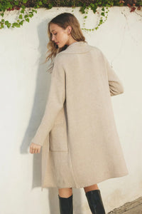 Woman modeling cozy open long cardigan with pockets, stylish and comfortable for fall