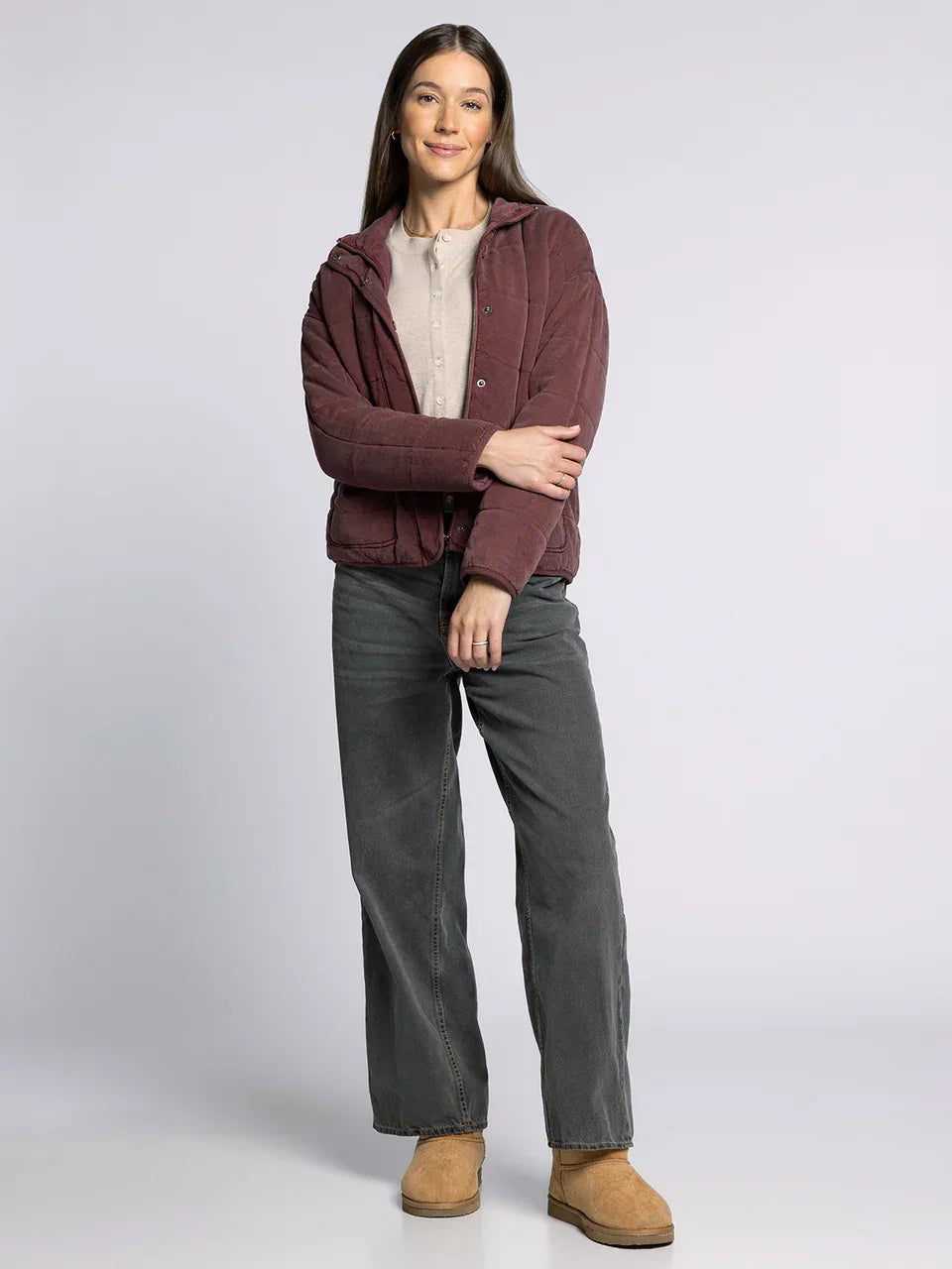 Woman wearing the supply brina jacket in maroon quilted puffer style with hood