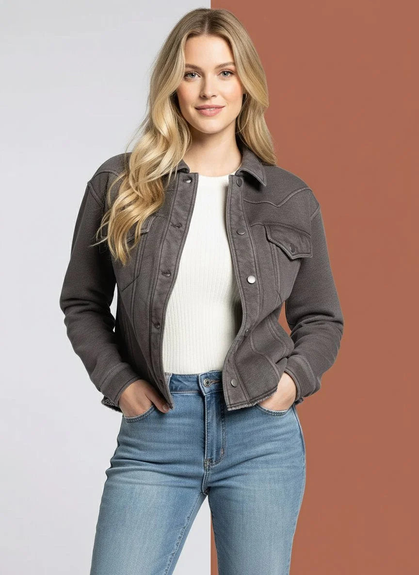 Woman modeling the Supply Marion Jacket with a white ribbed top and light-wash jeans