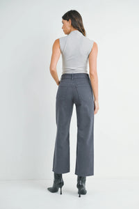 Woman modeling NAUTICAL HIGH RISE WIDE LEG DENIM with light gray sleeveless top