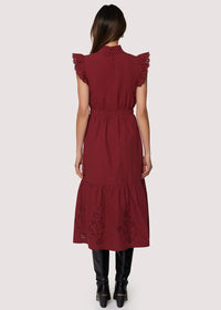 Woman modeling LOST + WANDER ARTISTA AURA MIDI DRESS in maroon with eyelet hem and ruffles