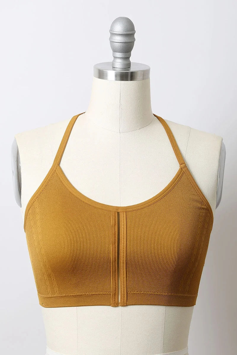 Woman modeling a Seamless Longline Pullover Boho Bralette in mustard color