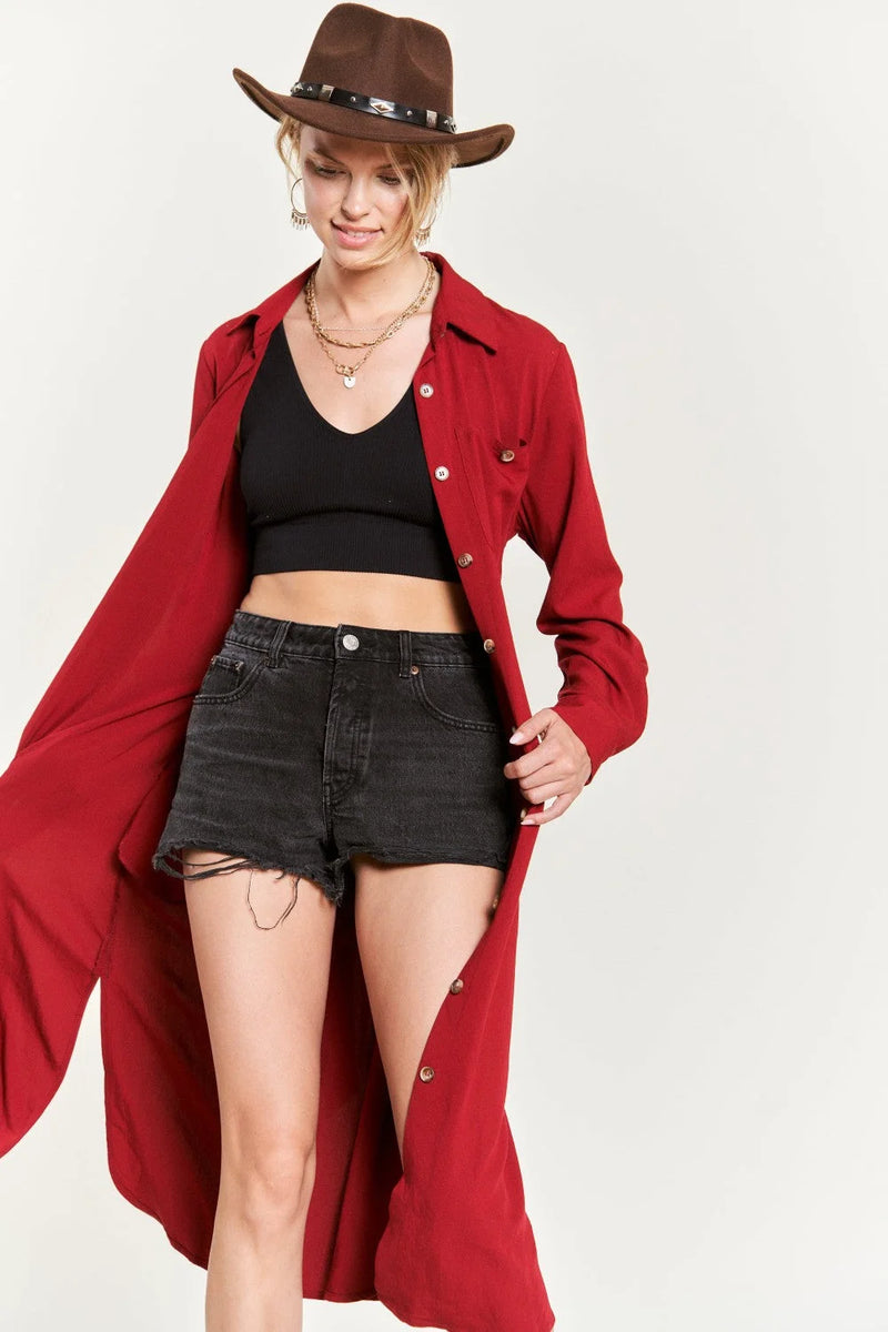 Woman in a red coat and black shorts showcasing a Solid Button Down Belted Long Dress