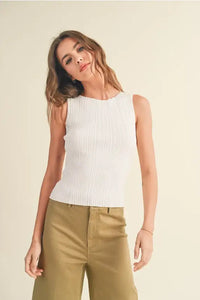 Woman in ribbed knitted top and khaki pants, showcasing women’s boho chic clothing at Shop Daisy