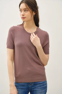 Ultra soft women’s boho chic short sleeve sweater tee in mauve with blue jeans