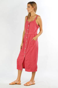 Woman wearing a TENCEL BUTTON UP sleeveless midi dress in reddish-pink with belt and sandals