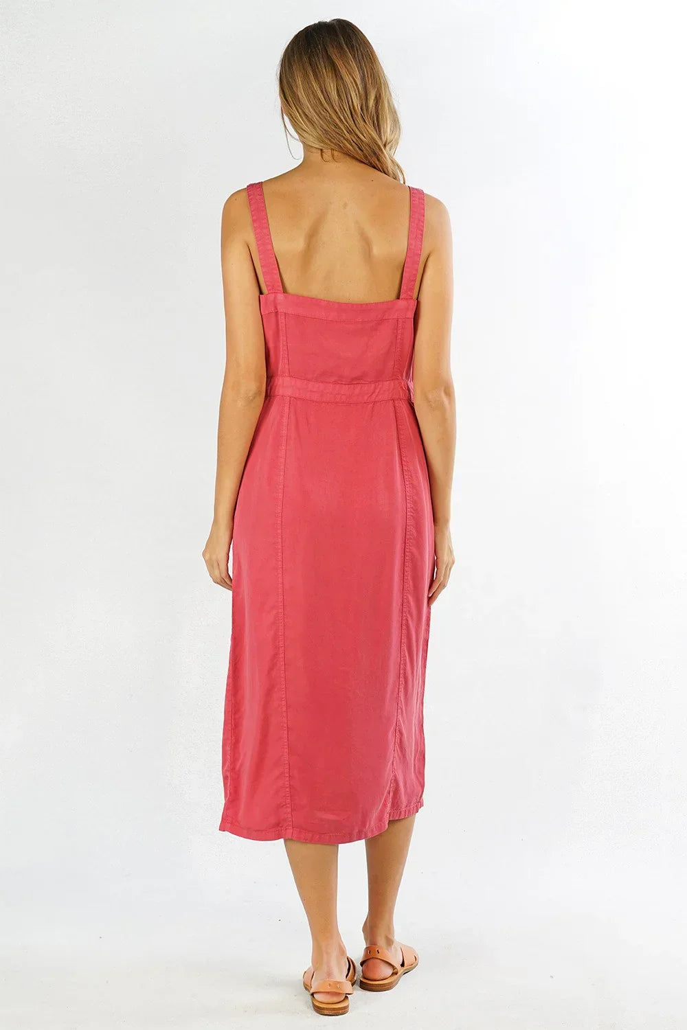 Woman wearing a rose-colored sleeveless midi dress with a square neckline and wide straps, TENCEL Button Sleeveless Midi Dress