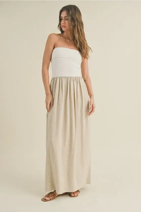 Woman in a strapless maxi dress highlighting the LINEN KNITTED TOP COMBO DRESS care instructions