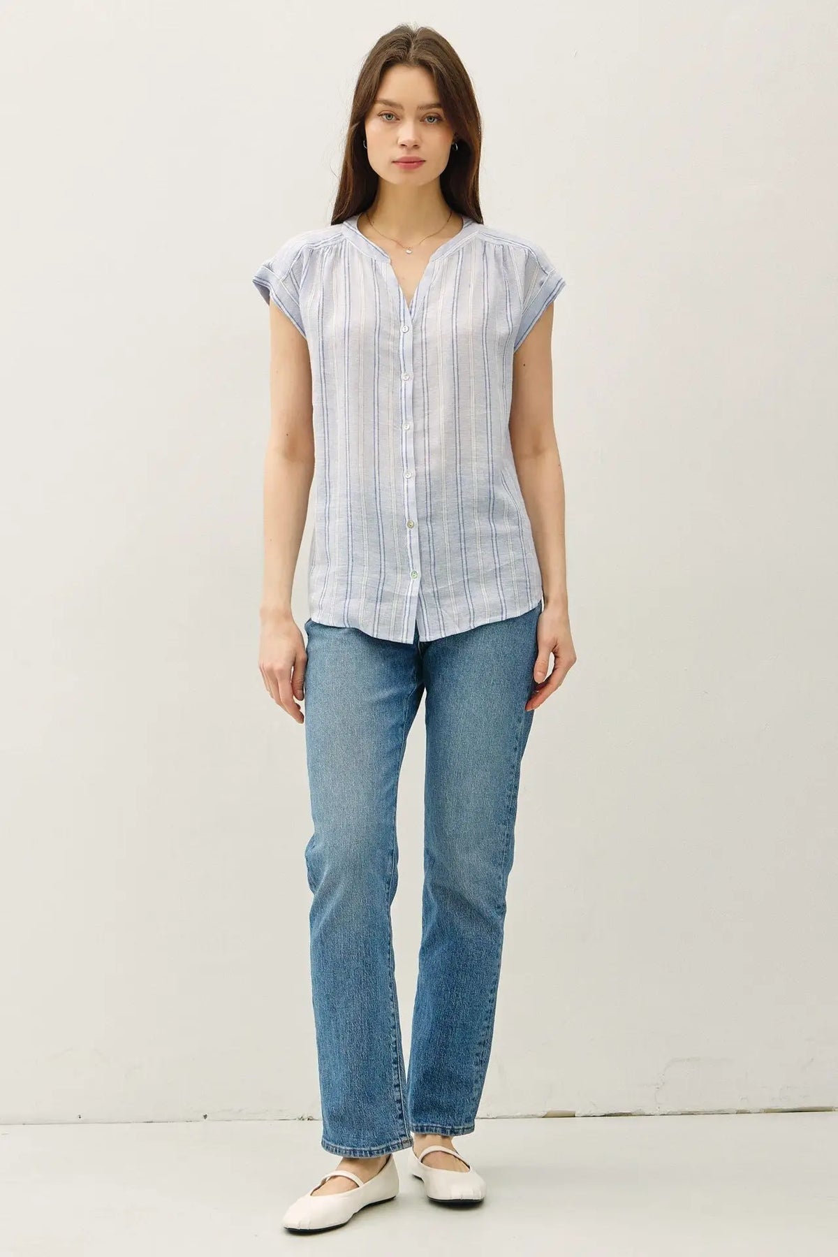 Woman wearing Striped Mandarin Collar Linen Shirt showcasing women’s boho chic clothing