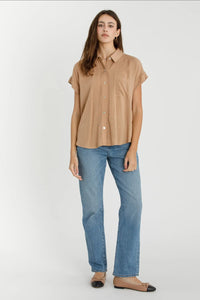 Woman wearing SOLID SHORT SLEEVE BUTTON DOWN SHIRT in women’s boho chic clothing