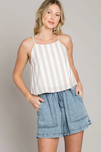 Woman in a white and beige striped top showcasing Woven Flowy Culottes