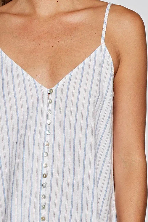 Woman wearing striped button front tank top, perfect for women’s boho chic clothing from Shop Daisy