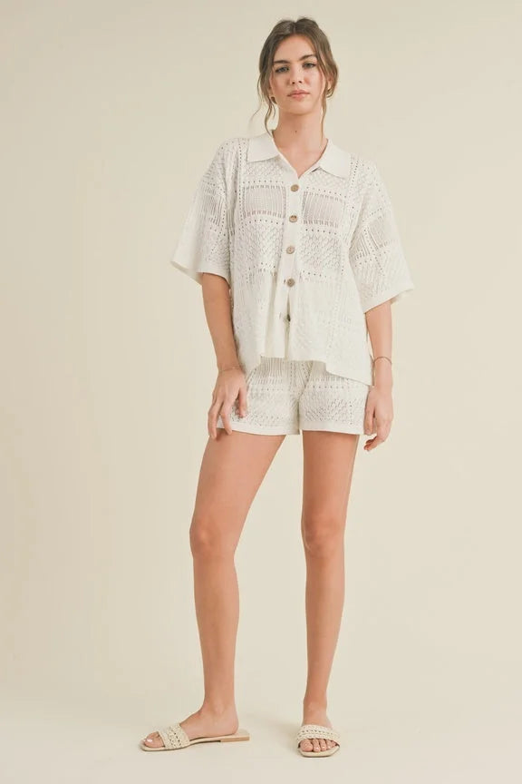 Woman in a white shirt with MATCH PATTERN KNITTED SHORTS for stylish summer outfits