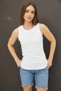 Woman wearing BASIC SOLID RAISED HEM COTTON CREW NECK TANK with denim shorts, shop Daisy