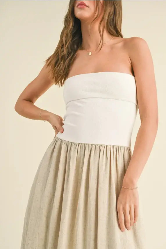 Woman in a white tube top and tan skirt showcasing the Linen Knitted Top Combo Dress