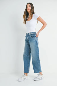 Woman wearing wide leg denim in black wash jeans from The Seamed Barrel Wild Leg collection