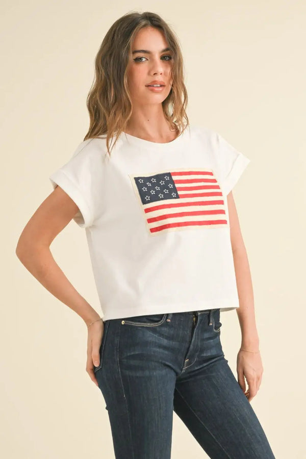 Woman wearing American Flag Cotton Top, perfect for women’s boho chic clothing at Shop Daisy
