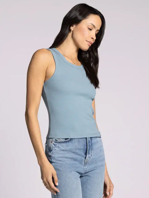 Woman’s blue ribbed tank top from THREAD & SUPPLY EVIE TANK, a stylish basic solid tank