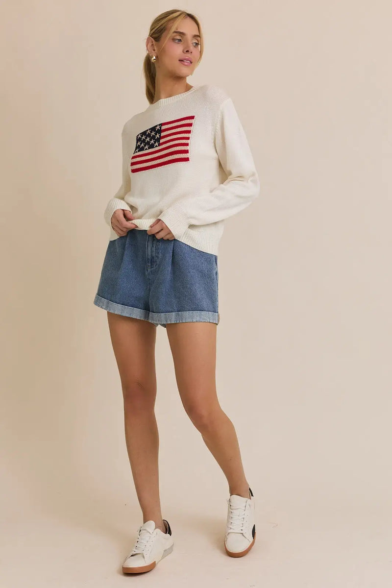 Woman’s casual outfit featuring American Flag Round Neck Sweater Top on model