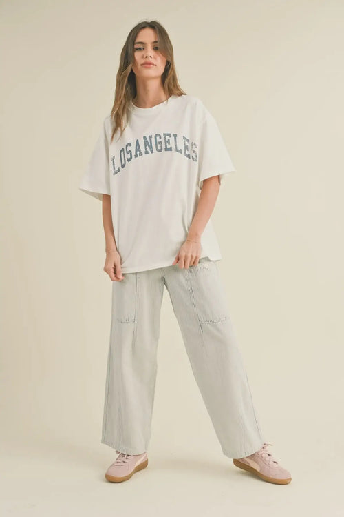Woman’s casual outfit featuring Stripe Washed Barrel Shape Pants with Pockets