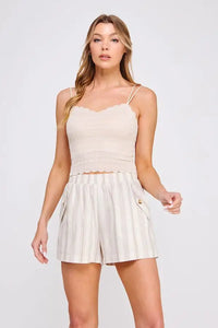 Woman’s casual summer outfit featuring Daisy Lane’s scallop edge bralette with whimsical trim