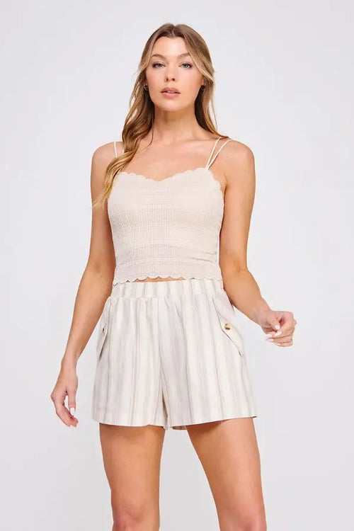 Woman’s casual summer outfit featuring Daisy Lane’s scallop edge bralette with whimsical trim