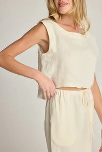 Woman’s cream-colored linen top and pants set from SUNDAY RITUAL ELENA TOP, perfect for women’s boho chic clothing from Shop Daisy