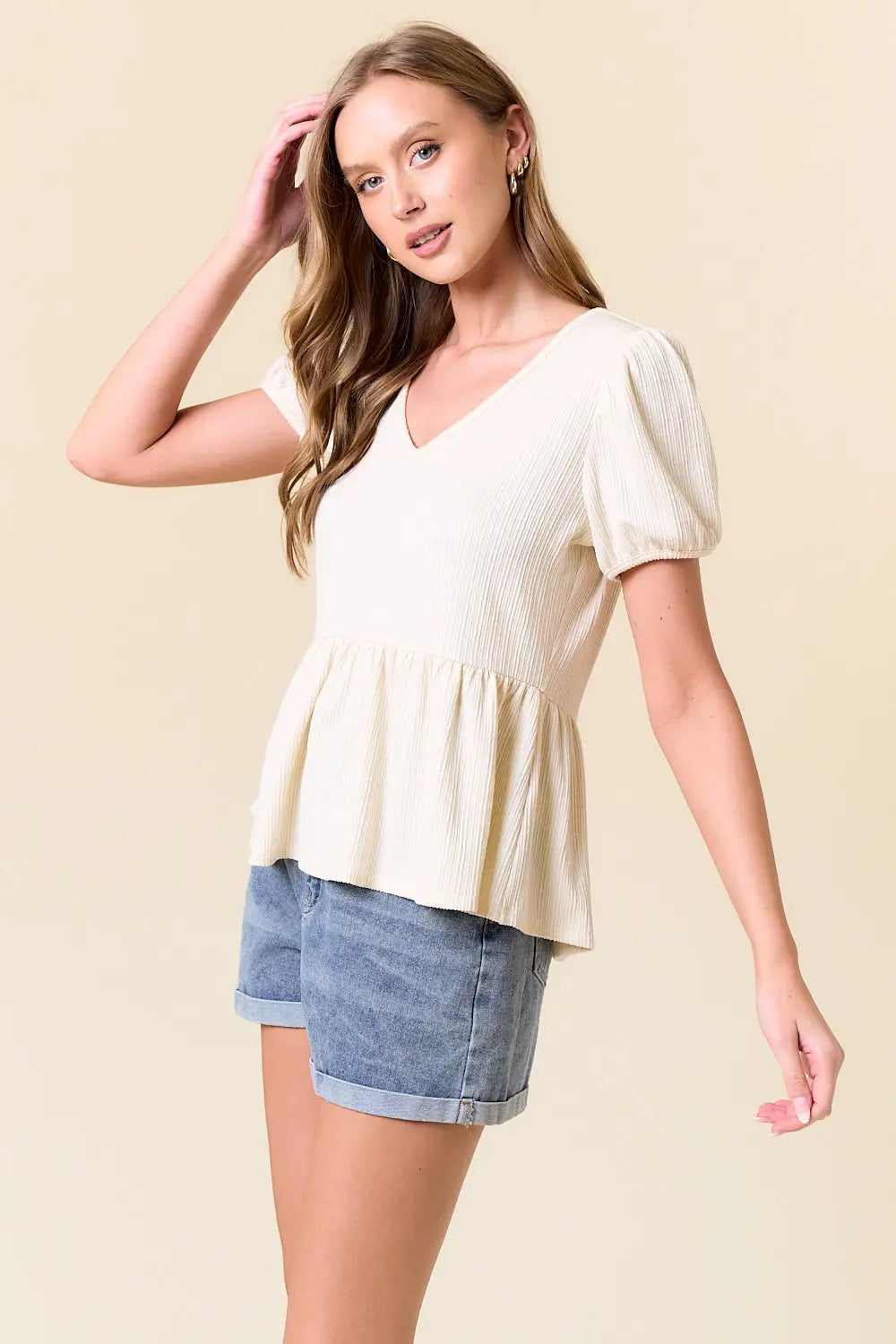 Cream-colored slub ribbed V-neck puff short sleeve women’s boho chic clothing top at Shop Daisy