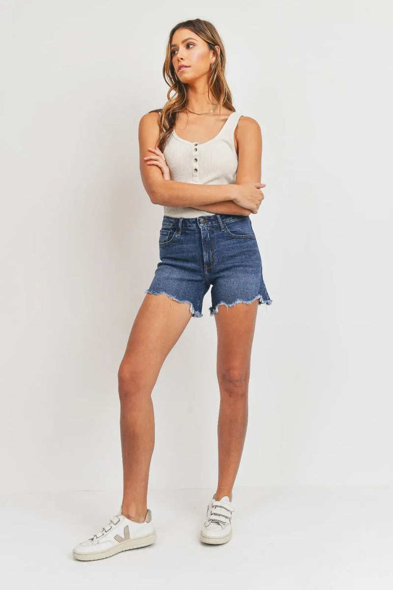 Woman’s denim tomboy short with high-low hem detail for summer wear